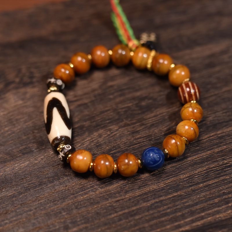 Tibetan-Style Ox Bone Bracelet with Tiger Eye Dzi Bead – Handcrafted Spiritual Protection Jewelry