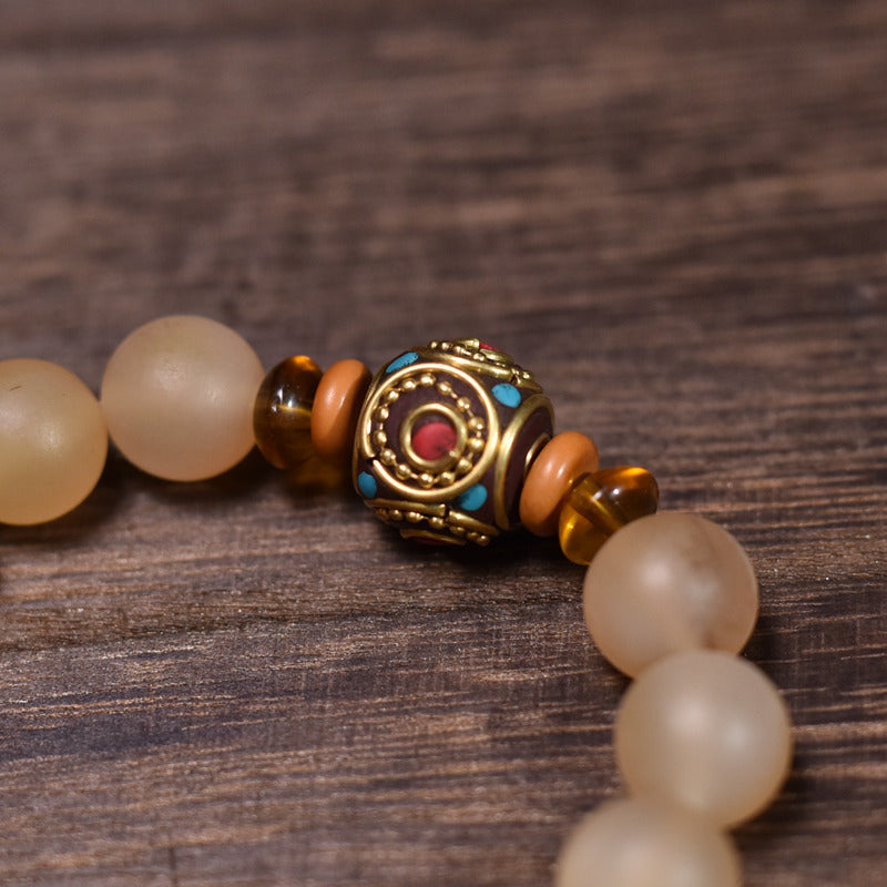 Natural Tibetan Sheep Horn Prayer Bead Bracelet with Peace Token